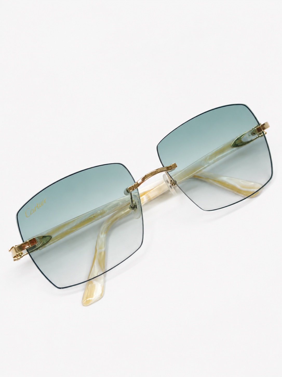 Cartier Ivory Teal Smooth Lenses front view